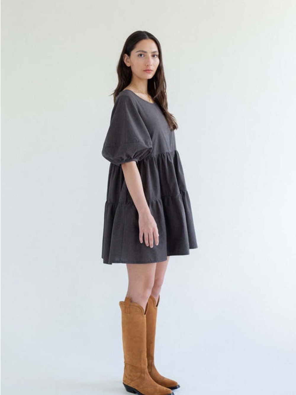 A Bronze Age Puff-Sleeve Tiered Mini Dress in black
